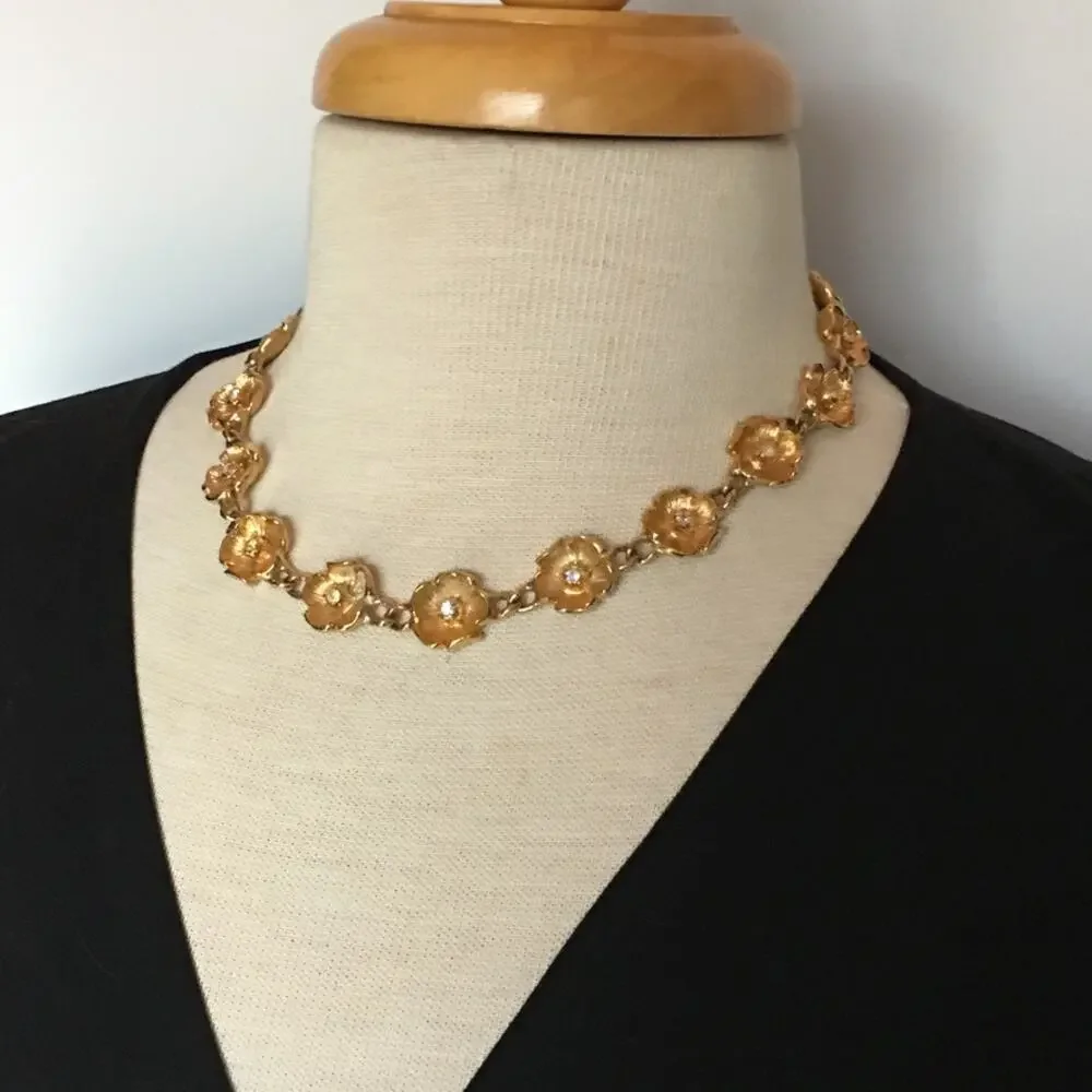 Vintage gold tone flower chain necklace with rhinestone accents